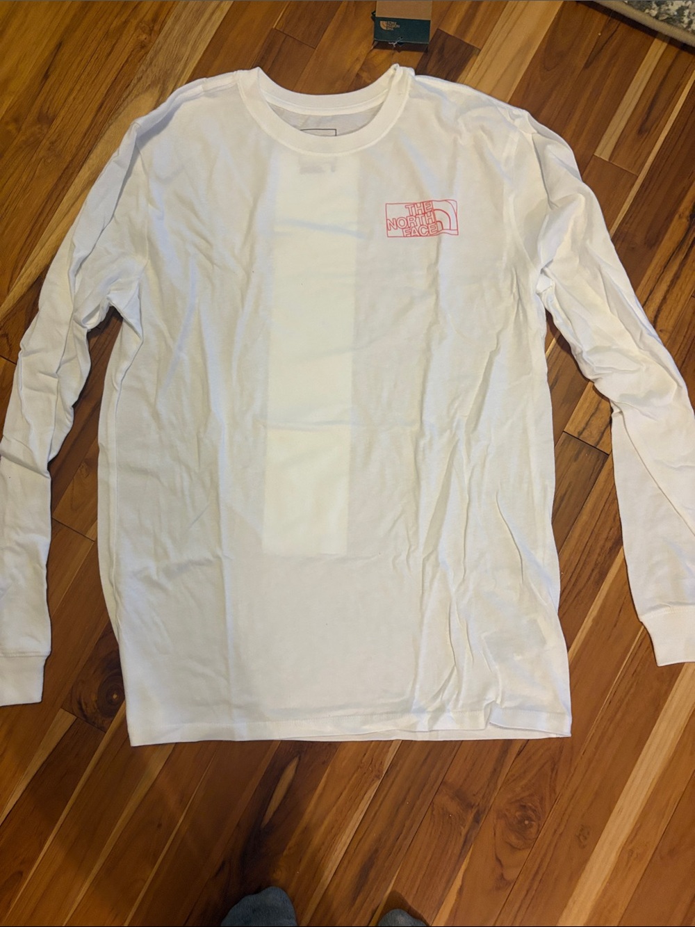 The North Face Men’s Long Sleeve Tee - White with Pink Logo
